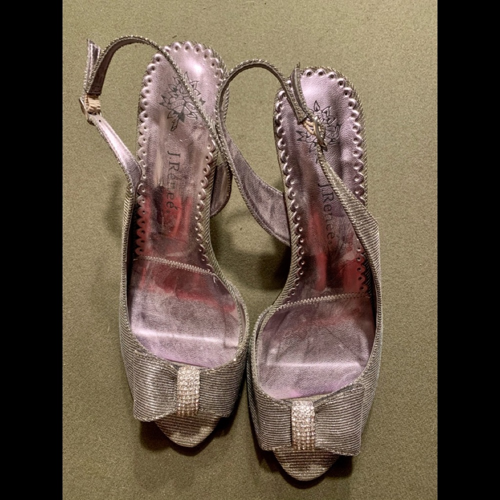 Silver sparkly pumps with rhinestone trim